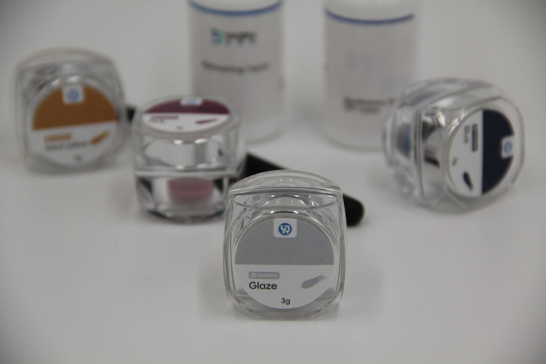 Bộ Nhuộm Gốm Zirconia 18 Màu Yucera Unique Smile Solutions Tự Nhiên cho Sáng Tạo Phòng Thí Nghiệm Nha Khoa