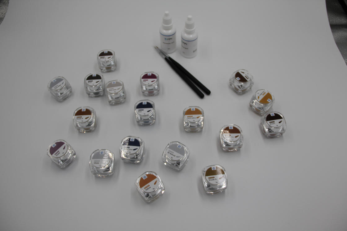 Bộ Nhuộm Gốm Zirconia 18 Màu Yucera Unique Smile Solutions Tự Nhiên cho Sáng Tạo Phòng Thí Nghiệm Nha Khoa